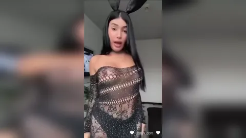 Bunny girl cosplayer taking a dildo inside for her fans